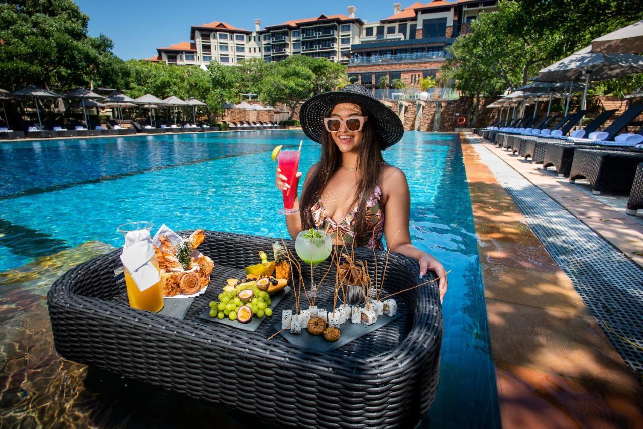 The Capital Zimbali Hotel Ballito Eksteriør billede Poolside at the hotel